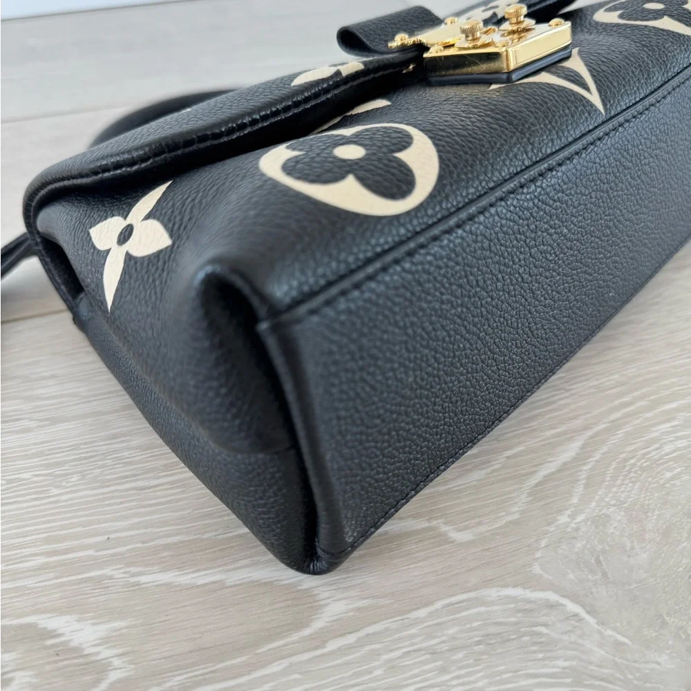 LOUIS VUITTON
Empreinte Monogram Giant Madeleine BB Black Beige - Picture 4 of 8
